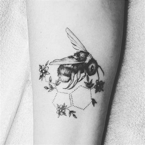 black and white bee tattoo.